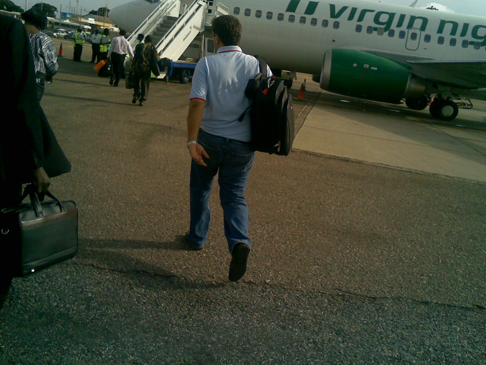 Passengers boarding a Virgin Nigeria plane at Kotoka International Airport in Accra, Ghana.