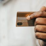 Person making a payment on a mobile phone