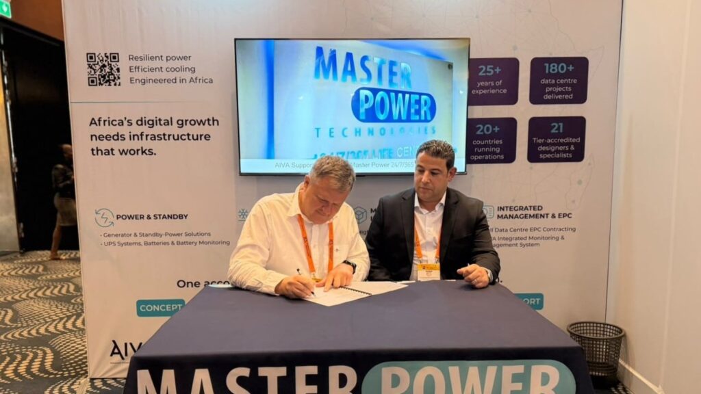 Menno Parsons of Digital Parks Africa signs the Uptime Institute Tier IV engagement for NDC1, with Tarik Bahanniss of Uptime Institute, at ITW Africa in Nairobi