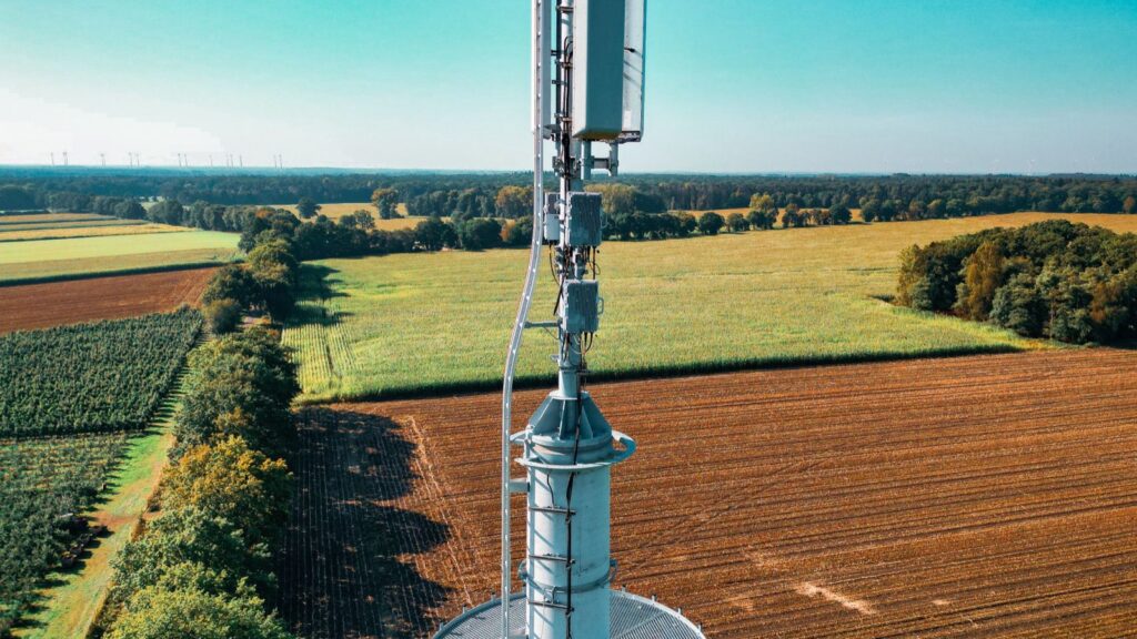 Mobile phone mast standing among farmland