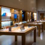 Smartphones and accessories on display in an electronics shop