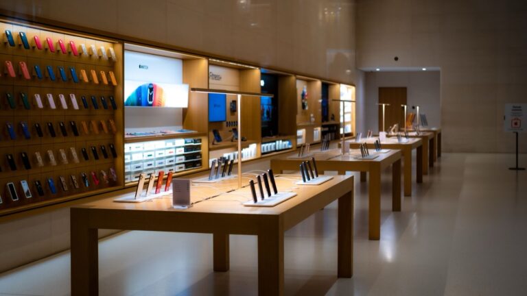 Smartphones and accessories on display in an electronics shop