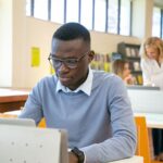 A student working on a laptop
