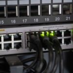 Networking equipment with cables connected to its ports