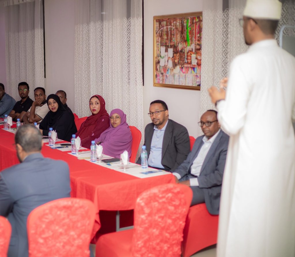 Q&A: building a digital Islamic bank in Somaliland 11 Staff and guests seated around a conference table during a Wadaag Bank briefing session in Hargeisa, Somaliland.
