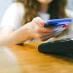 A contactless payment being made with a smartphone