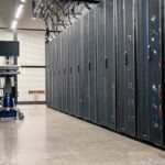 Server cabinets and networking equipment inside a data centre