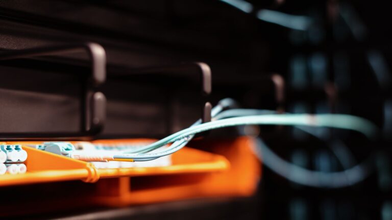 Network cabling connected to equipment in a data centre