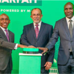 Three executives press a launch button in front of a green Ziidi Shari'ah Fund backdrop, powered by M-PESA.